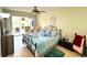 Inviting bedroom with a cozy bed, patio access, and relaxing color scheme at 2205 Belleair Rd # A7, Clearwater, FL 33764