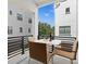 Exterior balcony with outdoor furniture, perfect for enjoying city views at 224 S Audubon Ave, Tampa, FL 33609