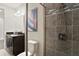 Modern bathroom featuring a tile shower and sleek vanity at 224 S Audubon Ave, Tampa, FL 33609