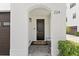Inviting entryway with a charming arched alcove and a cozy seating area at 224 S Audubon Ave, Tampa, FL 33609