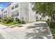 A view of the townhome complex, showcasing the well-maintained landscaping and architecture at 224 S Audubon Ave, Tampa, FL 33609