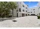 Beautiful townhome exterior with a two-car garage and manicured landscaping at 224 S Audubon Ave, Tampa, FL 33609