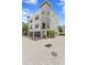 Stunning three-story home with a two-car garage and beautiful architectural details at 224 S Audubon Ave, Tampa, FL 33609