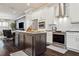 Well-equipped kitchen with stainless steel appliances, granite countertops, and a central island at 224 S Audubon Ave, Tampa, FL 33609