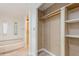Bathroom with stained glass windows, bathtub, shower, and closet at 238 Pelican N Dr, Oldsmar, FL 34677