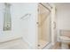 Bathroom featuring stained glass window, bathtub, shower, and toilet at 238 Pelican N Dr, Oldsmar, FL 34677