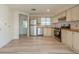 Functional kitchen featuring stainless steel appliances and light wood-look floors at 238 Pelican N Dr, Oldsmar, FL 34677