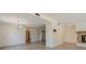 Open living space features new flooring, ample lighting, and seamless transition to other rooms at 238 Pelican N Dr, Oldsmar, FL 34677