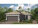Charming single-story home with a two-car garage, lush landscaping, and a welcoming entrance at 29548 Zupetta Ln, Wesley Chapel, FL 33543