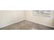 Neutral bedroom with carpeting and a window with light coming through at 3005 E Sligh Ave, Tampa, FL 33610