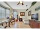 Bedroom with wood floors, a bay window, vanity, and bright natural light at 3033 Marble Crest Dr, Land O Lakes, FL 34638