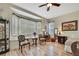 Bright bedroom featuring a bay window, wood floors, vanity and natural light at 3033 Marble Crest Dr, Land O Lakes, FL 34638