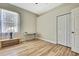 Spacious bedroom offering natural light and wood flooring, ready for your personal touch at 3033 Marble Crest Dr, Land O Lakes, FL 34638