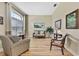 Cozy living room with comfortable seating and natural light at 3033 Marble Crest Dr, Land O Lakes, FL 34638