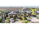 Charming townhome exterior with manicured landscaping and a private two-car garage at 30903 Quail Caper Cir, San Antonio, FL 33576