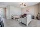 Relaxing living area with tile floors and comfortable seating at 30903 Quail Caper Cir, San Antonio, FL 33576