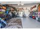 Well-organized garage with storage solutions, a spare refrigerator, and plenty of room for parking at 31616 Parkland Bay Way, San Antonio, FL 33576