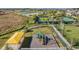 Community playground area with modern play equipment and lush landscaping at 31616 Parkland Bay Way, San Antonio, FL 33576