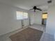 Bedroom with neutral walls, ample natural light, and convenient laundry access at 410 42Nd Ne Ave, St Petersburg, FL 33703