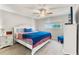 Serene bedroom featuring a ceiling fan, comfortable bed, and a window with natural light at 4210 Ironwood Cir # 501J, Bradenton, FL 34209