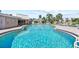 Bright swimming pool with crystal blue water and plenty of lounge chairs to soak up the sun at 4210 Ironwood Cir # 501J, Bradenton, FL 34209