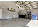 Spacious garage features ample storage and a utility sink at 4702 Corsage Dr, Lutz, FL 33558