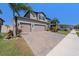 Spacious two-story home boasting a three-car garage and paved driveway at 4923 Eagle Rock Dr, Wimauma, FL 33598