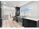 Modern kitchen with stainless steel appliances, sleek countertops, and an open design for entertaining at 4934 Dr Martin Luther King Jr N St, St Petersburg, FL 33703