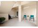 Inviting covered porch featuring seating, decor, and a welcoming entrance at 5800 Sabal Trace Dr # 301, North Port, FL 34287