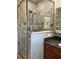 Well-appointed bathroom with tiled shower, granite counter and modern fixtures at 609 49Th Street W Ct, Bradenton, FL 34209