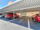 Carport featuring two cars with spots labelled 401, 402, and 403, in a convenient parking area at 7665 Sun Island S Dr # 401, South Pasadena, FL 33707