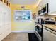 Kitchen with stainless steel appliances and great storage space at 7665 Sun Island S Dr # 401, South Pasadena, FL 33707