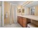 Bathroom featuring vanity area with an extended countertop and ample storage at 7701 Starkey Rd # 526, Seminole, FL 33777