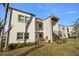 Exterior shot of the building featuring stucco and a balcony at 7701 Starkey Rd # 526, Seminole, FL 33777