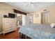 Comfortable bedroom with a sliding glass door leading to an outdoor area at 7701 Starkey Rd # 526, Seminole, FL 33777