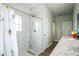 Bathroom with marble shower, granite countertops, and modern fixtures at 7735 Wauchula Rd, Myakka City, FL 34251