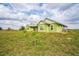 This charming home features a well-kept lawn and a welcoming exterior, perfect for peaceful living at 7735 Wauchula Rd, Myakka City, FL 34251