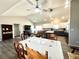 Open-concept living space showcasing a modern kitchen and dining area at 7735 Wauchula Rd, Myakka City, FL 34251