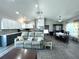 Bright living space with open kitchen, dining area, and cozy seating at 7735 Wauchula Rd, Myakka City, FL 34251