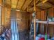 Inside the shed, equipped with shelving, ladders, and storage for tools and equipment at 7882 42Nd N Ave, St Petersburg, FL 33709