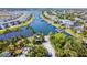 Aerial view of the community boat ramp, private boat docks, and waterfront homes at 824 Islebay Dr, Apollo Beach, FL 33572