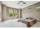 Spacious bedroom featuring neutral-toned walls and large windows offering bright, natural light at 824 Islebay Dr, Apollo Beach, FL 33572