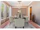 Elegant dining room featuring a chandelier, and an elegant table set for dinner at 824 Islebay Dr, Apollo Beach, FL 33572