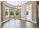 Bright dining area with a bay window and a view of the outdoor patio at 824 Islebay Dr, Apollo Beach, FL 33572