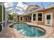 Enjoy the outdoors in this screened in pool and patio area at 824 Islebay Dr, Apollo Beach, FL 33572