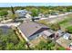 Aerial view of the home's backyard and wooded surroundings at 8551 N Hyaleah Rd, Tampa, FL 33617