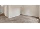 This large bedroom offers neutral walls and soft carpet at 8551 N Hyaleah Rd, Tampa, FL 33617