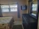 Cozy bedroom with dark wood furniture and neutral walls at 10039 62Nd N Ave # 14, St Petersburg, FL 33708