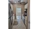 Modern kitchen with stainless appliances, granite countertops and tile floors at 10039 62Nd N Ave # 14, St Petersburg, FL 33708