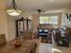 Inviting living room featuring comfortable sofas, a ceiling fan, and a dining area in view at 10039 62Nd N Ave # 14, St Petersburg, FL 33708